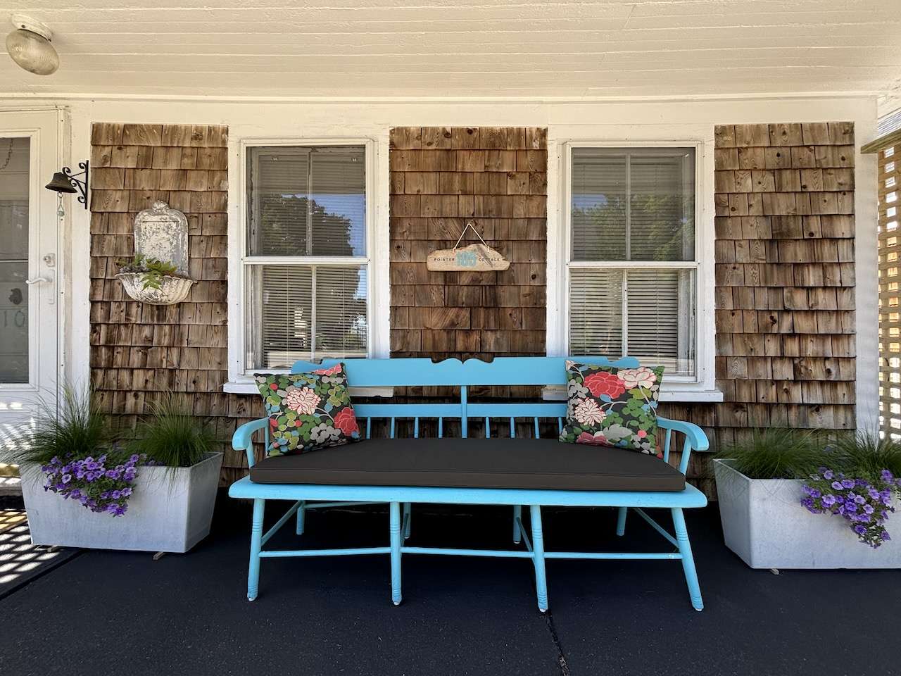 Enjoy your morning coffee on the bench out front.