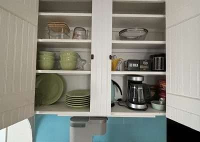 Place setting for four, coffee and tea supplies. Mixing & prep supplies.